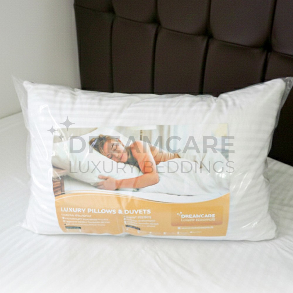 cotton_pillow Cotton Cover Washable Pillows | DreamCloud - Image 1